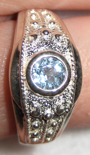 Blue Topaz Set in Textured Silver Ring size 9